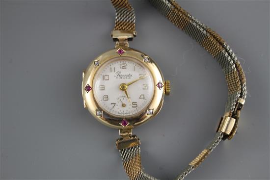 A ladys mid 20th century 14k, ruby and diamond set Precista manual wind dress wrist watch, on rolled gold and steel bracelet.